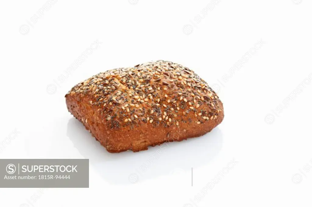 Granary roll with seed on white background, close up