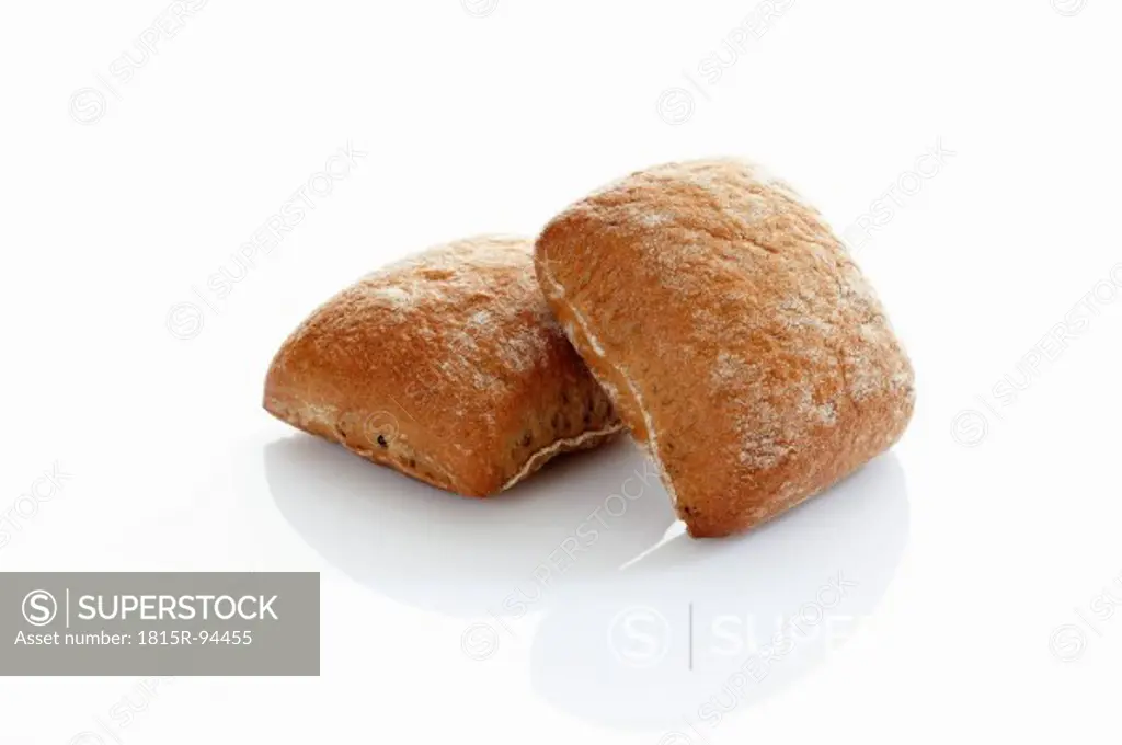 Rye and wheat mix bread on white background, close up