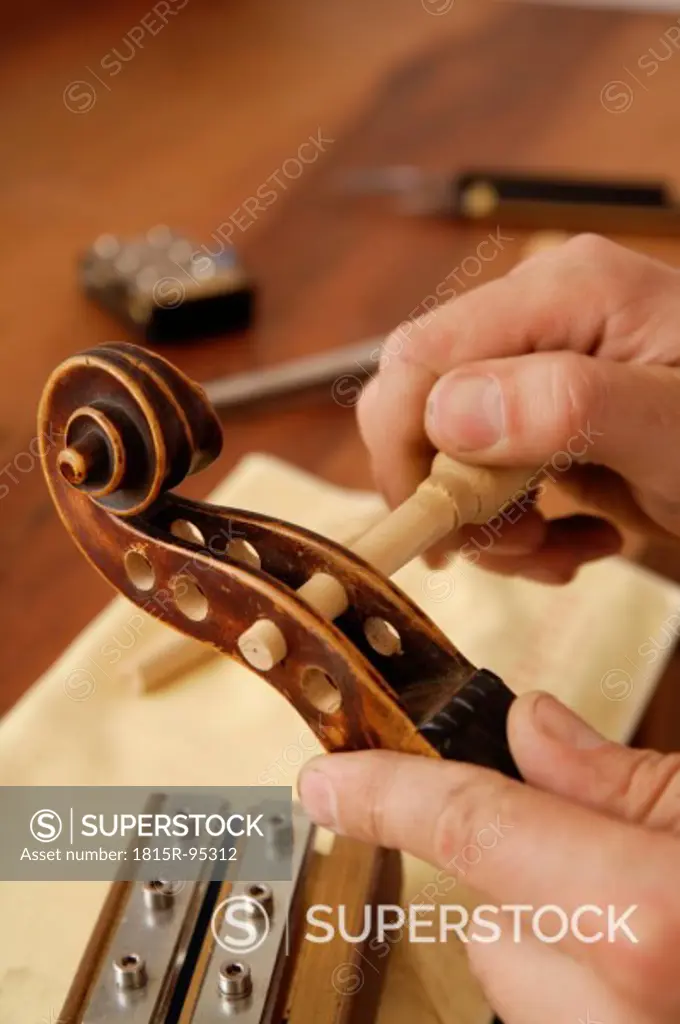 Germany, Upper Bavaria, Schaeftlarn, Violin maker making violin, close up