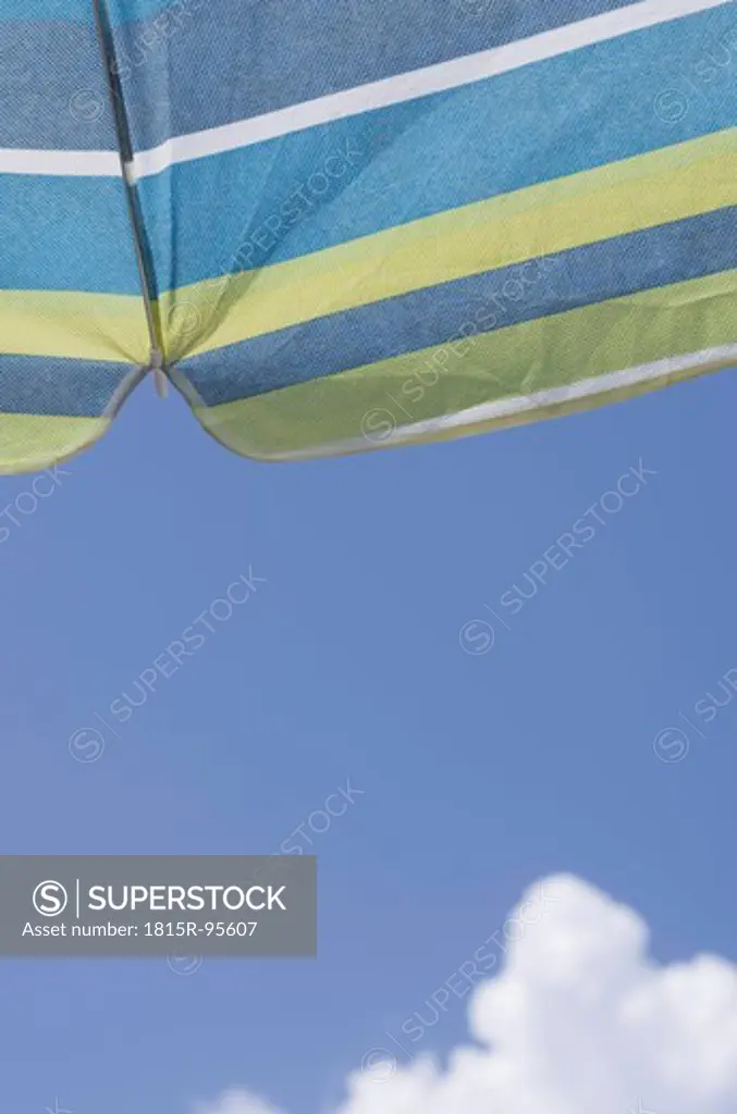 Greece, Ionian Islands, Ithaca, Beach umbrella against sky, close up