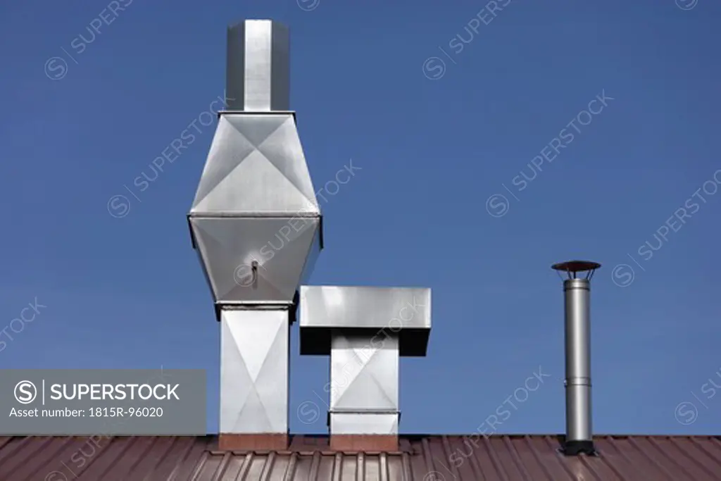 Germany, Upper Bavaria, Wolfratshausen, View of chimneys on industrial building