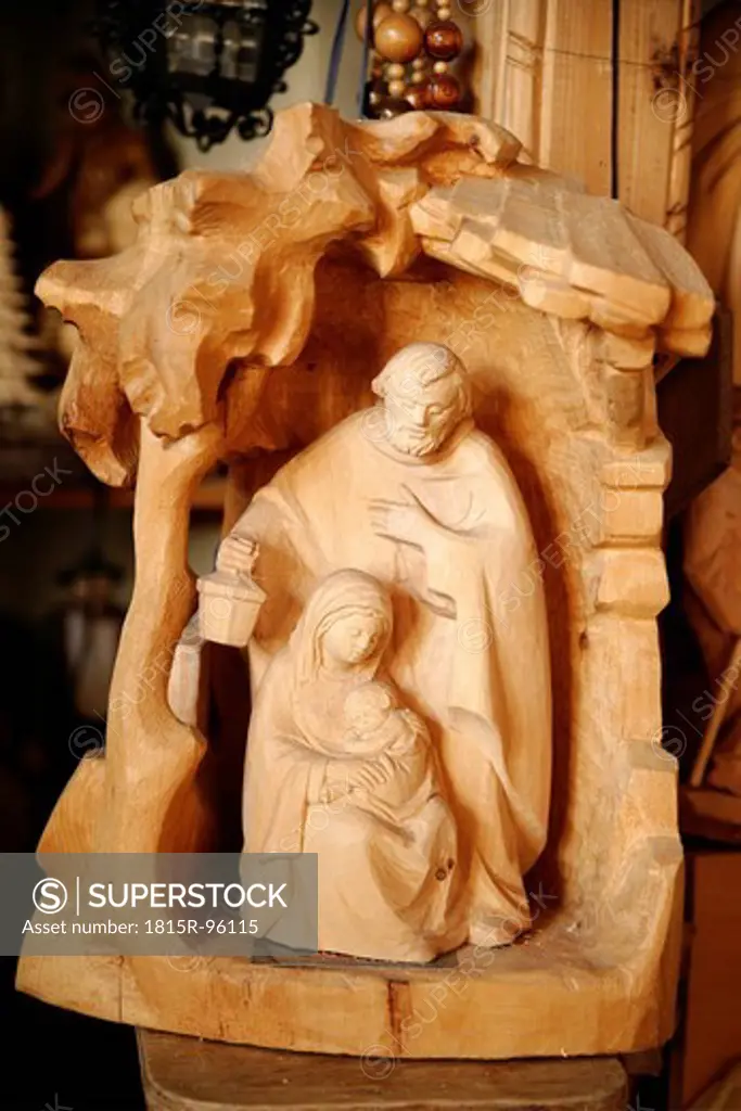 Germany, Upper Bavaria, Statues at wood carver studio, close up