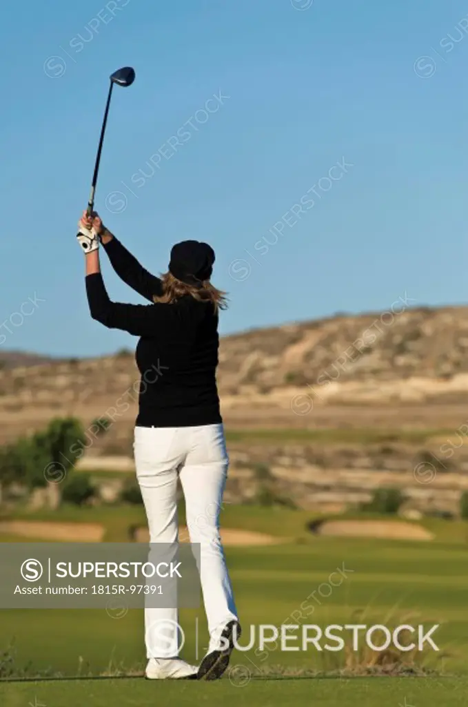 Cyprus, Woman playing golf on golf course
