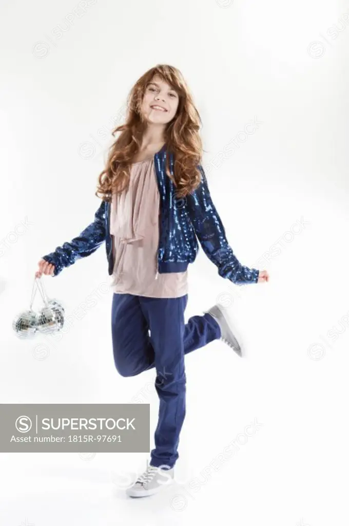 Girl with disco ball, smiling, portrait