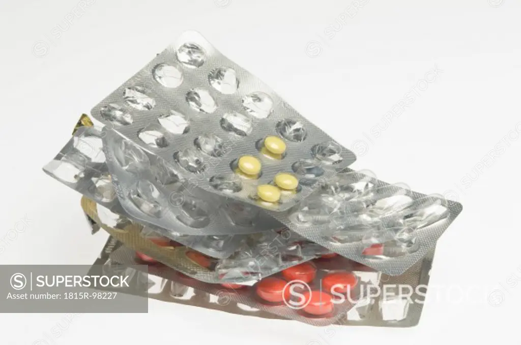 Blister pack with few tablet on white background