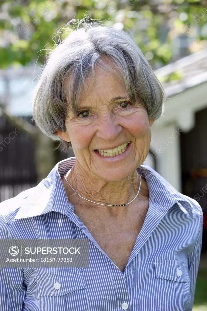 Germany, Bavaria, Senior woman smiling, portrait
