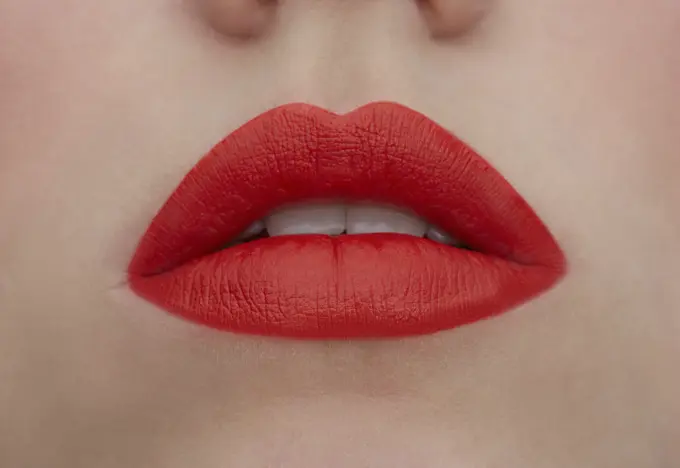 Made up red lips, close-up
