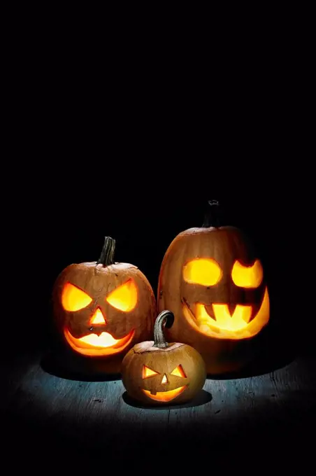 Halloween, pumpkins on wooden table