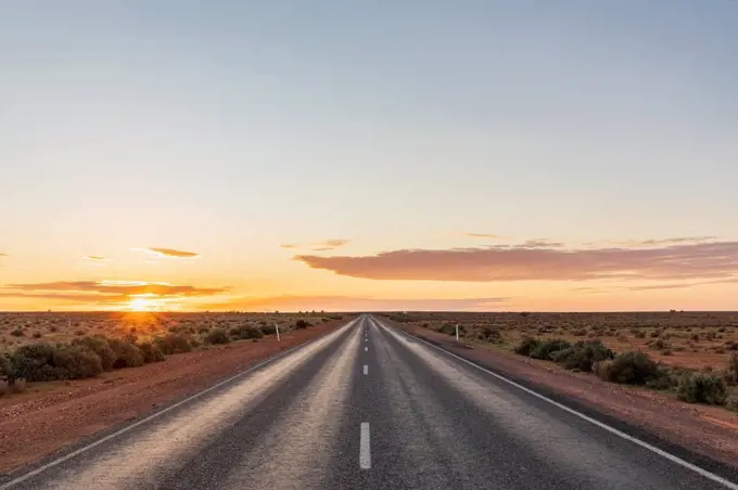 Australia, South Australia, Stuart Highway at sunset