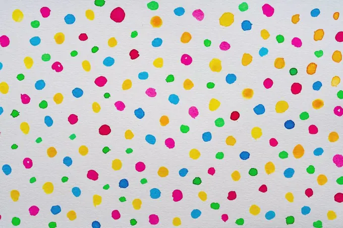 Colorful watercolor abstract dots pattern on white paper background