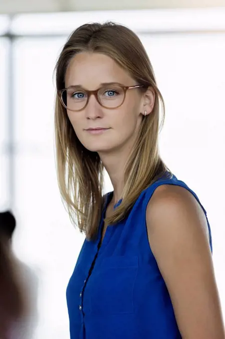Female entrepreneur wearing eyeglasses in office