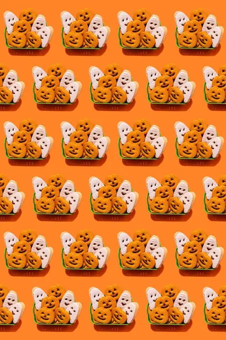 Pattern of baskets filled with Halloween themed cookies