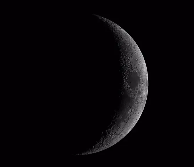 Astrophotography of moon in waxing crescent phase