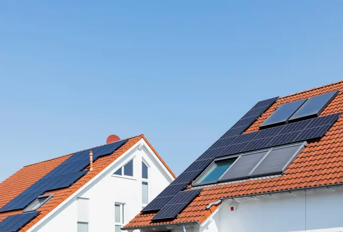 Germany, North Rhine-Westphalia,¶ÿSolar panels on tiled roofs of modern suburban houses