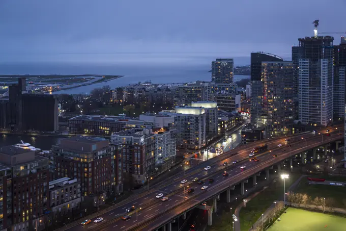 Canada, Ontario, Toronto, Aerial view of traffic on elevated city road at dusk
