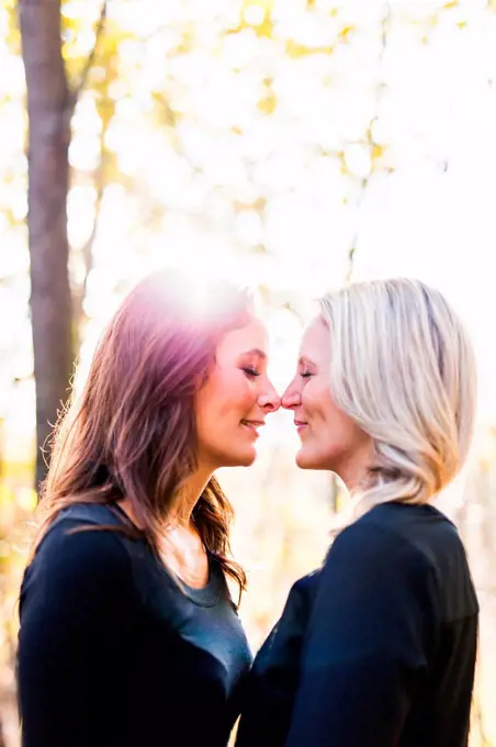 Lesbian couple rubbing noses
