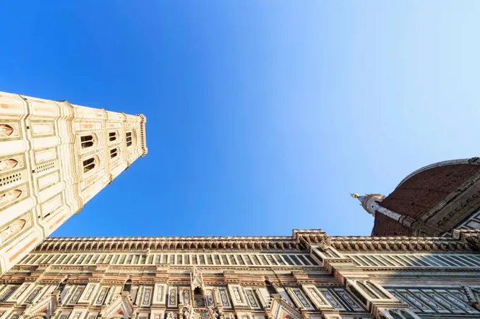 Italy, Florence, part of facade of Basilica di Santa Maria del Fiore and Campanile di Giotto