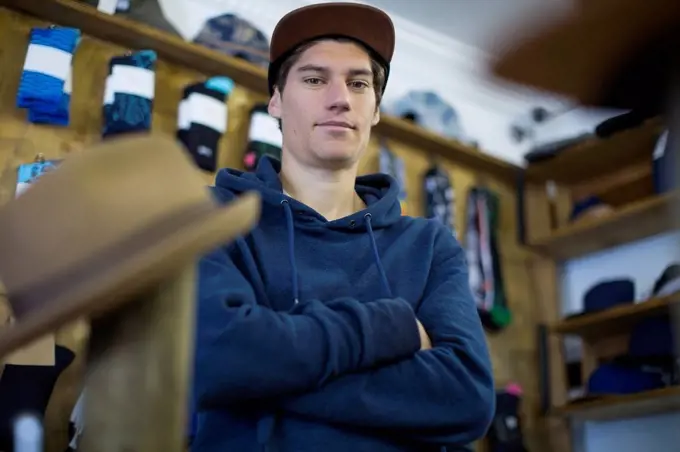 Salesperson in skater shop