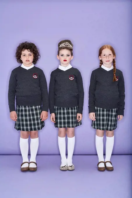 Porrtait of three girls wearing school uniform