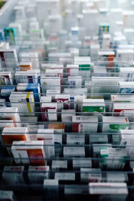 Medicine in shelves in commissioning machine in pharmacy