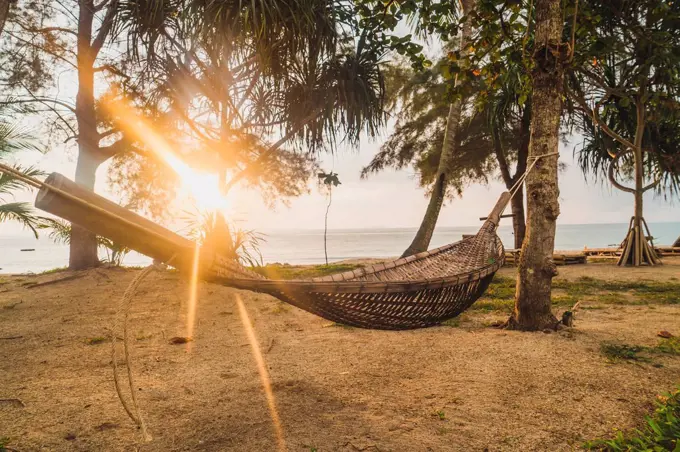 Thailand, Phi Phi Islands, Ko Phi Phi, hammock on the beach in backlight