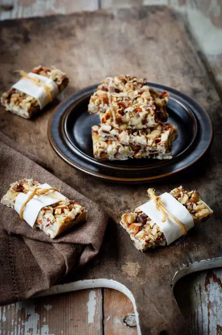 Homemade nut bars with cocoa butter, hazelnuts, walnuts and almonds
