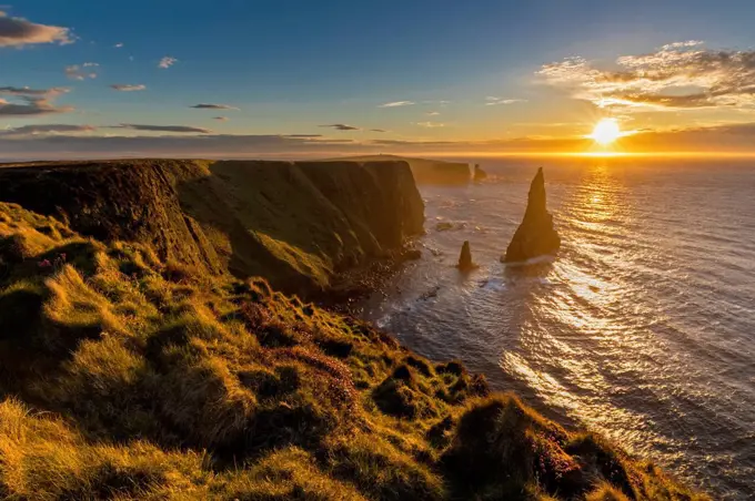 UK, Scotland, Caithness, Coast of Duncansby Head, Duncansby Stacks at sunrise