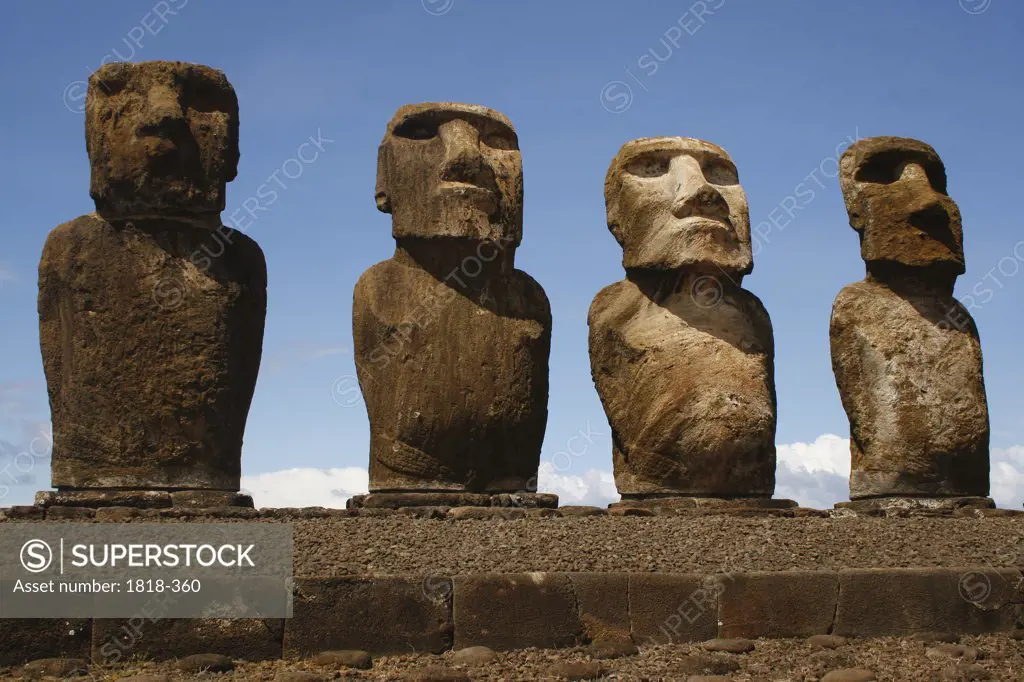 Low angle view of Moai statues in a row, Rano Raraku, Ahu Tongariki, Easter Island, Chile