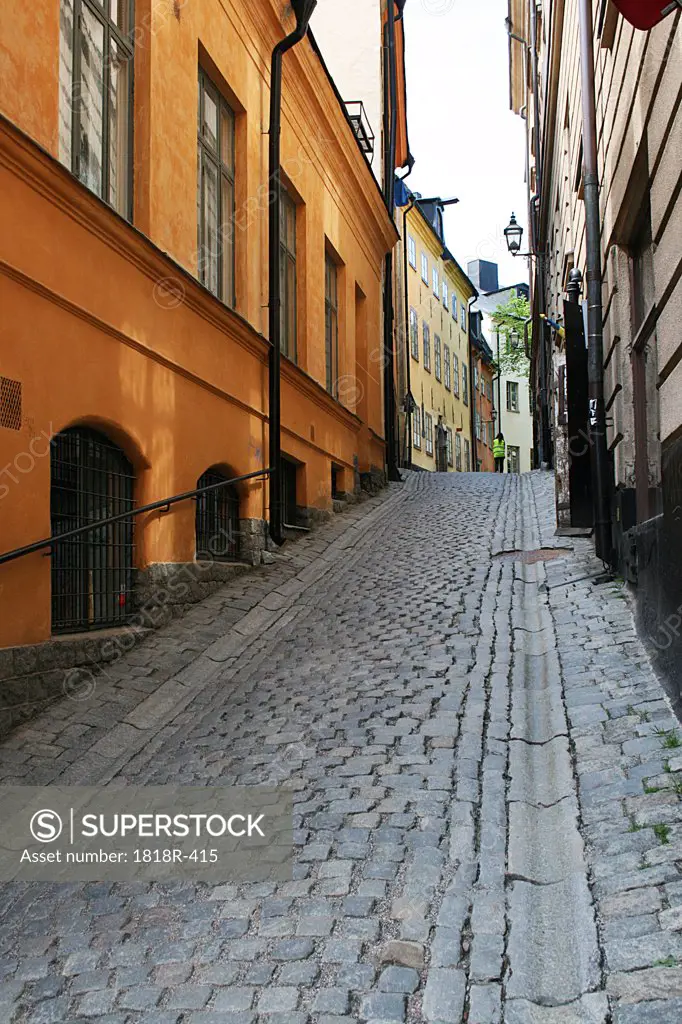 Sweden, Stockholm, Cobblestone street in Gamla Stan section