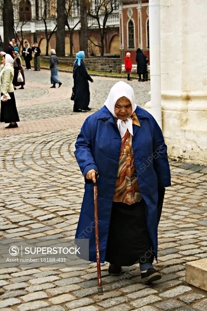 Russian ""Babushka"" peasant walking on street