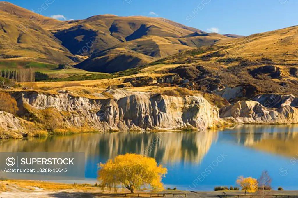 Overview of Foothills and Lake, Blue Lake, St. Bathans, Otago, South Island, New Zealand   