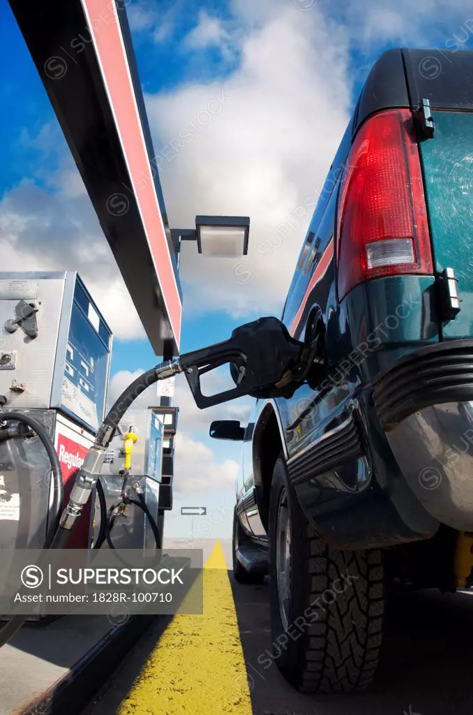 Close-up of truck being filled up at gas station, Trans Canada Highway, near Thunder Bay, Ontario, Canada. 09/07/2013