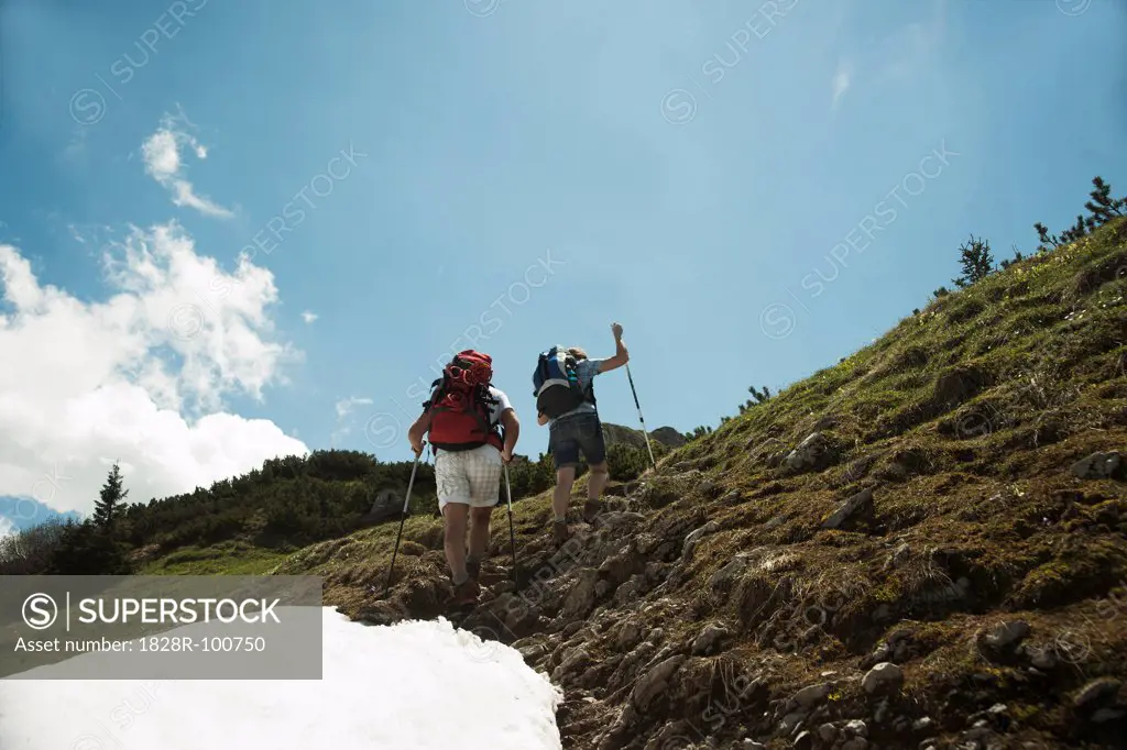 Mature Couple Hiking in Mountains, Tannheim Valley, Tyrol, Austria. 06/15/2013