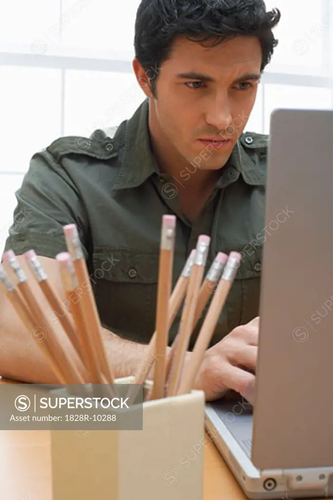 Man Using Laptop Computer   