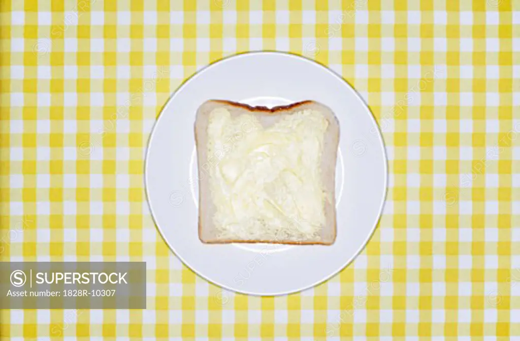 Slice of Bread with Butter on Plate   