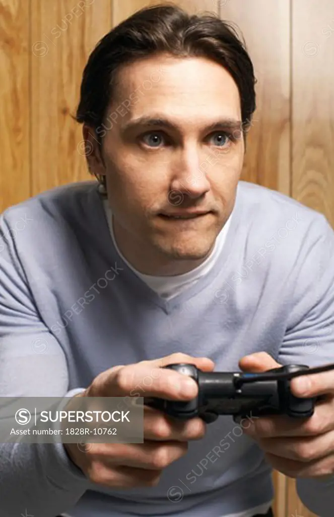 Man Playing Video Game   