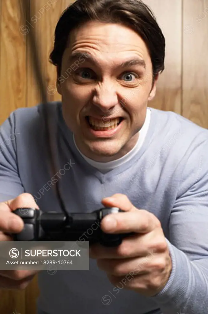 Man Playiing Video Game   