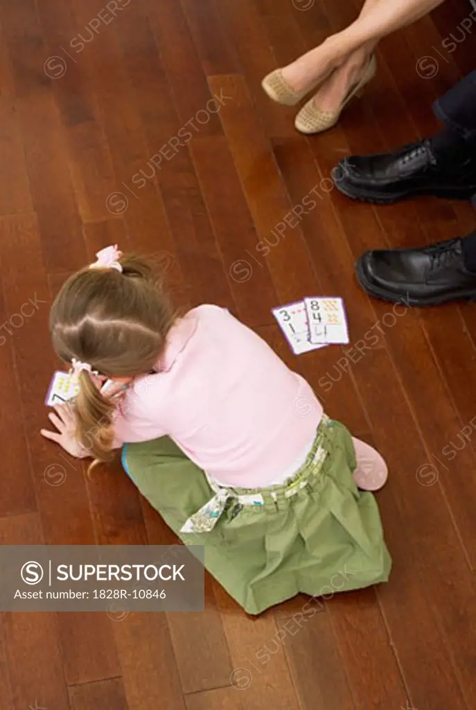 View of Girl Playing on Floor   