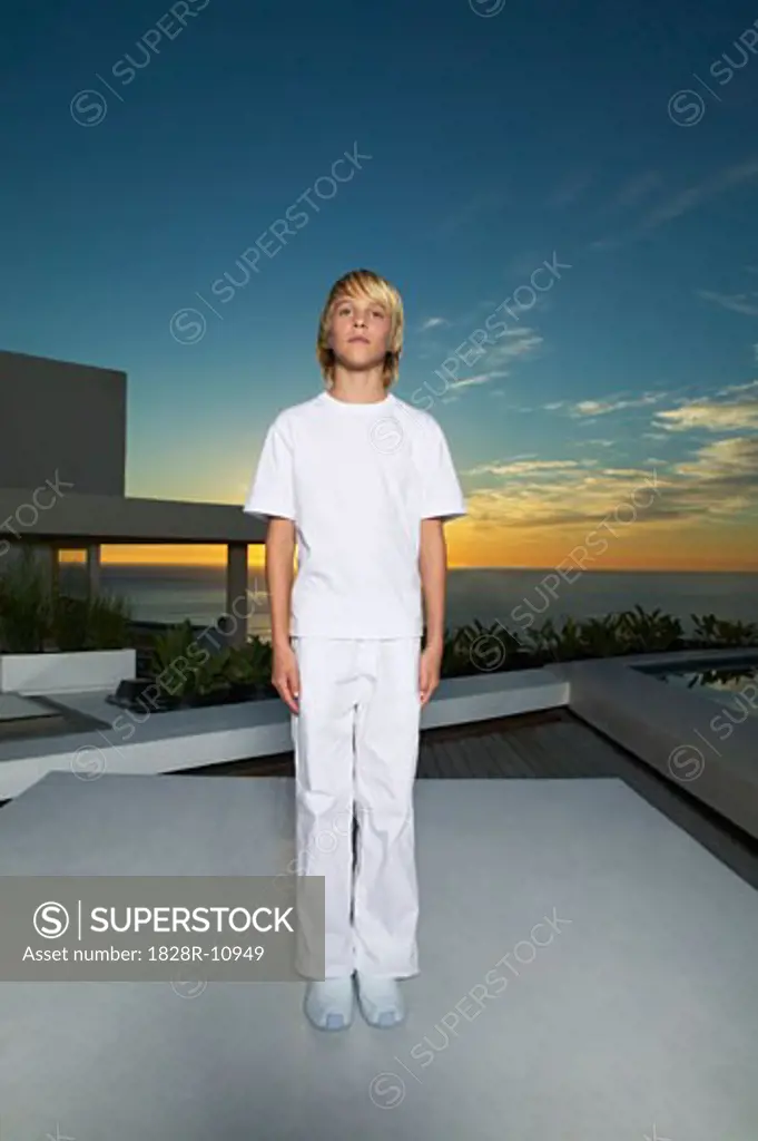 Portrait of Boy Standing on Patio   
