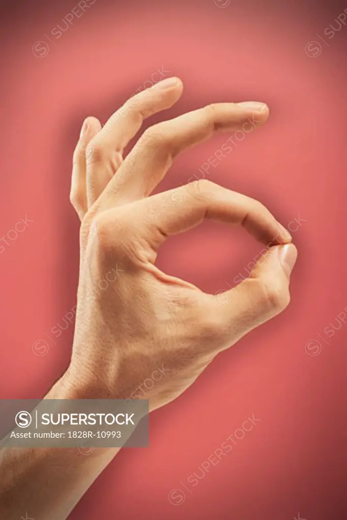Person's Hand Making OK sign   