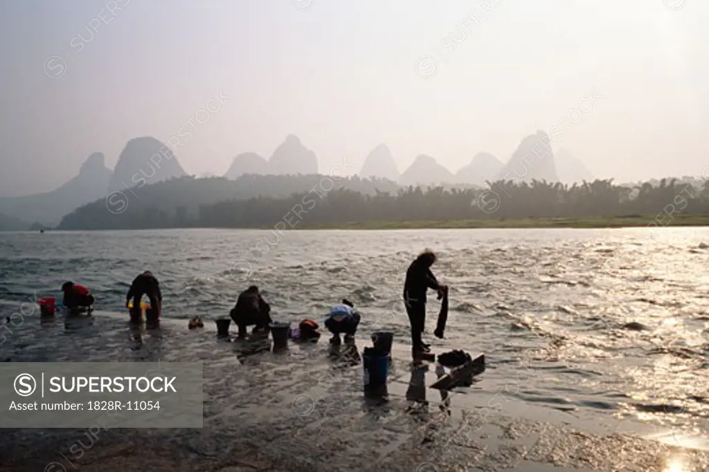 People Doing Laundry in Water, Yangzhou, China   