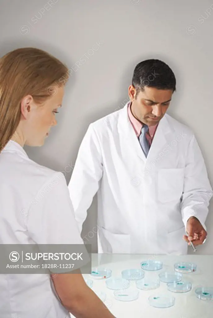 Doctors Performing Medical Test   