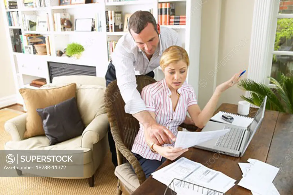 Couple Working in Home Office   