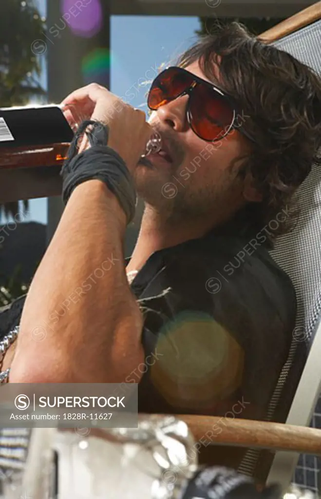 Portrait of Man Drinking   