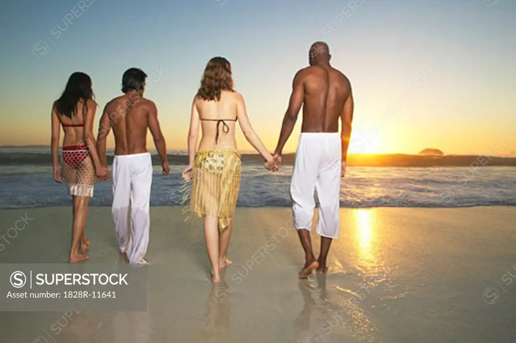 Couples Holding Hands at Beach   