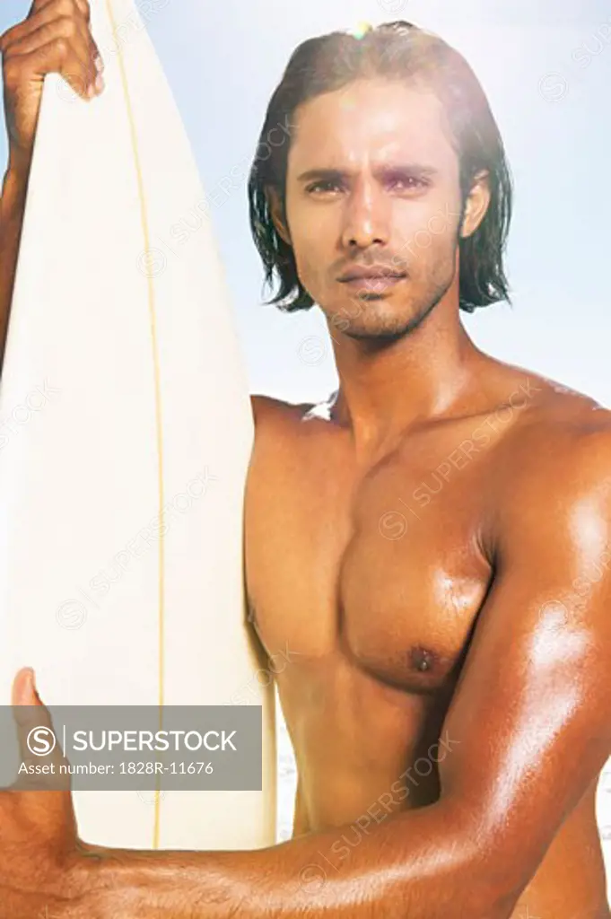 Portrait of Man with Surfboard   