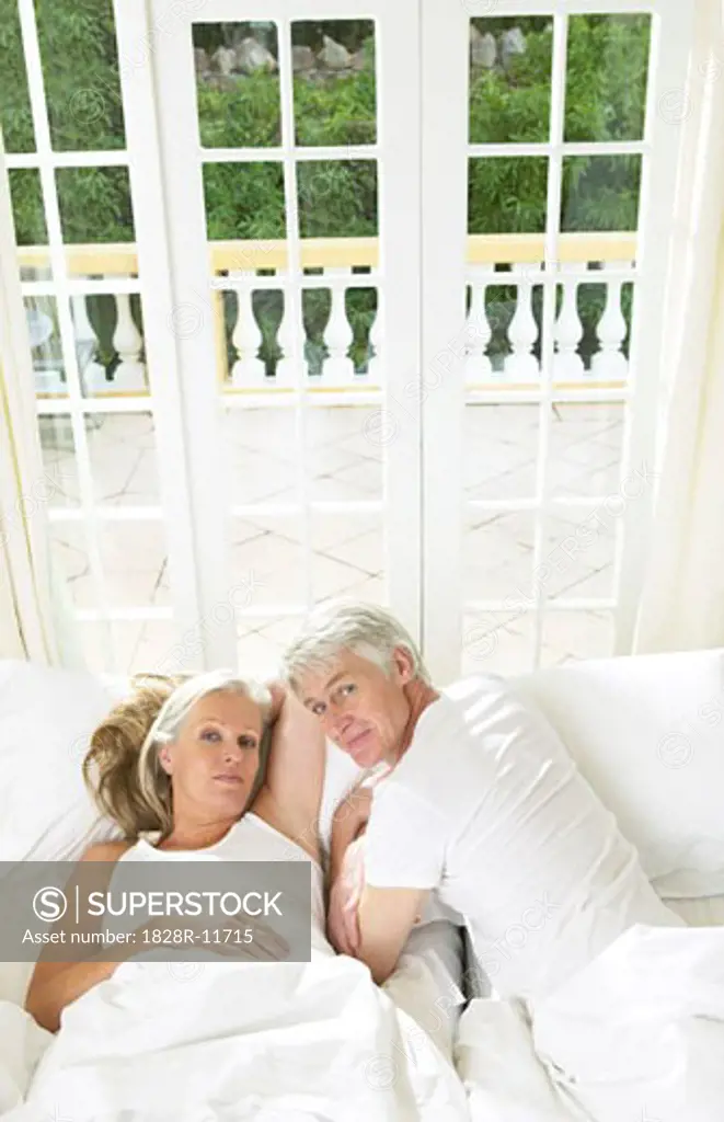 Mature Couple In Bed   