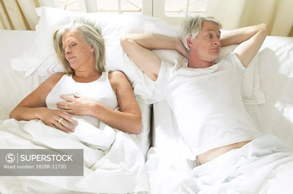 Mature Couple In Bed   