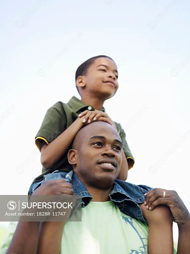 Portrait of Father and Son Outdoors   