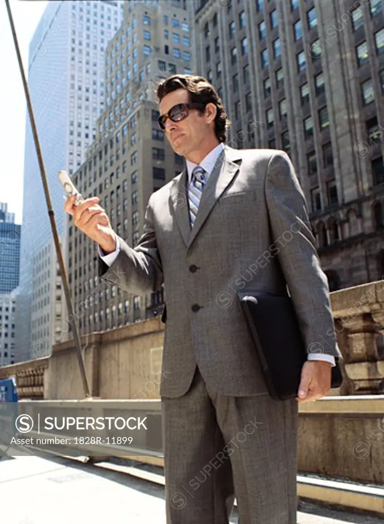 Businessman With Cellular Phone   